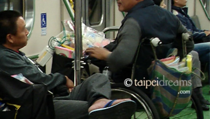 Wheelchair-Man-On-Taiwan-Train